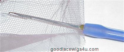 Close ups of Hooking Ventilating Needle Showing its size in relation 